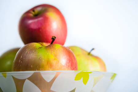 Ripe red apples with water dropletsの写真素材