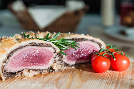 Meatloaf sectional with tomatoes and sesame seedsの写真素材