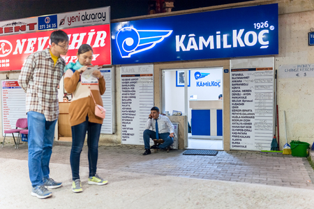 GOREME, Turkey - November 5, 2015: bus station in Goreme and touristsのeditorial素材