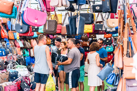 ISTANBUL, Turkey - November 2, 2015: Sale bags at Turkish bazaar. The Grand Bazaar is one of the largest and oldest covered markets in the world.のeditorial素材