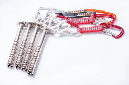 Ice screws and Quickdraw on a white background. Equipment ice cl