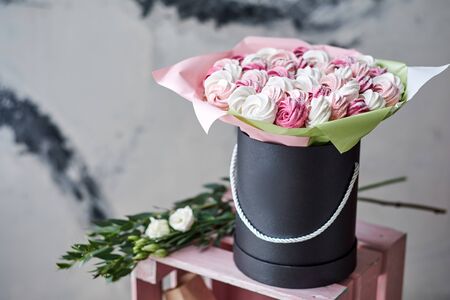 bouquet of sweet cakes. Gift in a beautiful package.