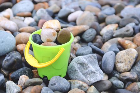 Bucket with pebblesの写真素材