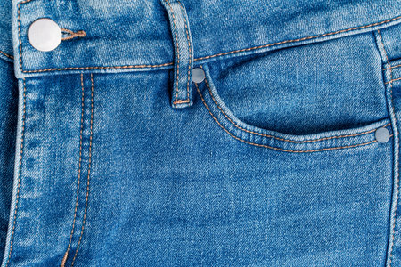 Close-up view of blue cozy casual jeans front made of comfortable soft modern denim material with...