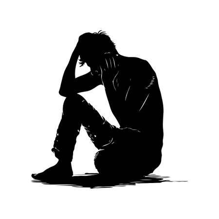 A distressed man sitting on the ground, holding his head in his hands, depicted in silhouette on a white background, symbolizing sadness and despairの素材