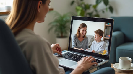 Woman attending an online tutoring session on laptop. Concept of online communication, virtual support, online therapyの素材