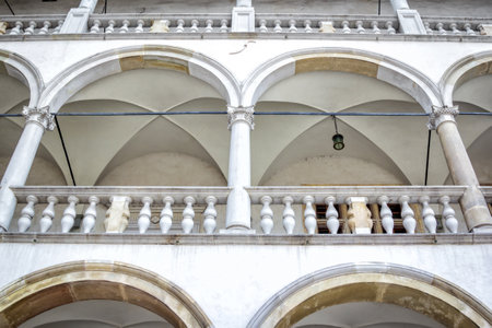 Krakow / Poland - August 14, 2017: Wawel Royal Castle, Sigismund I Stary's Palace courtyard arcades, close upのeditorial素材
