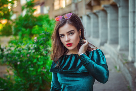 Woman wearing red velvet dressの写真素材