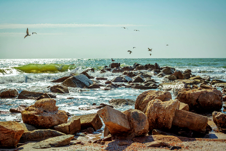 Storm seascape - flying over blue sky backgroundの写真素材