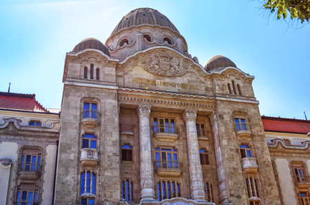 Budapest/Hungary- May 6, 2018: view of beautiful old historic building facade of Gellert Hotel, famous for its thermal baths, with columns, balconies and windows over blue sky background.のeditorial素材