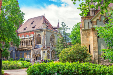 Budapest/Hungary- May 8, 2018: part view of Vajdahunyad Castle, built for Millennial Exhibition, displaying different architectural styles and now housing the biggest European Agricultural Museum.のeditorial素材