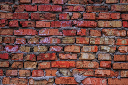 Old vintage red brick textured wall abstract backgroundの写真素材