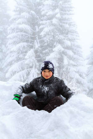 A child in the snow in Switzerland