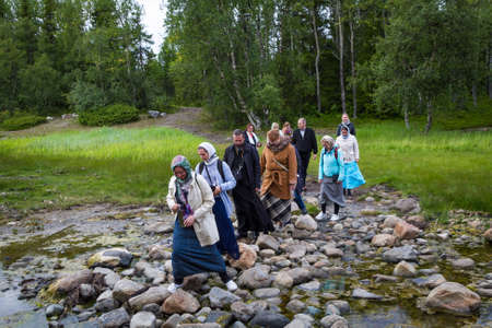 Solovki, Russia - June 26, 2016: The pilgrimage in the forest on Solovetsky islandのeditorial素材