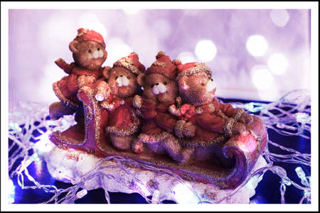 bears on sledge into blue lights の写真素材