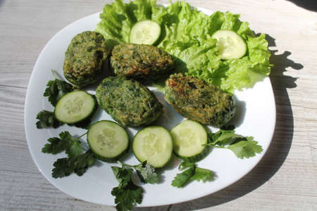 green vegetarian cutlets on leavesの写真素材