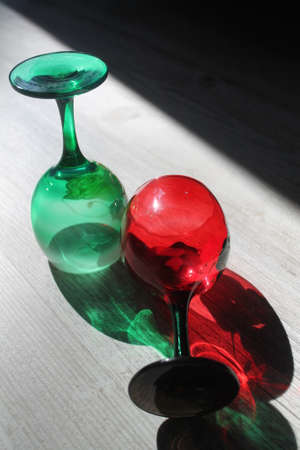 pair of red and green wineglassの写真素材