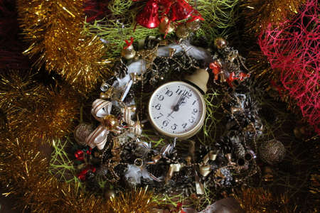 sparks, bells, toys, tinsel, wineglasses, clocks, ribbons and sweets all for decoration on Christmas and New Year holidayの写真素材