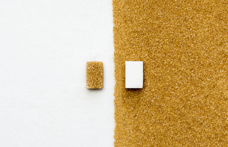 Color contrast between white sugar and brownの写真素材