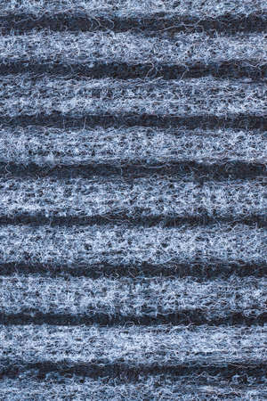 Background And Texture Of Striped Woolen Carpet Of Black, Gray And White Colors. Close Up.
