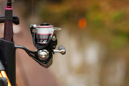Fishing Rod On Fishing Outdoor Background Blur Autumn. Close Up And Copyspace.の写真素材
