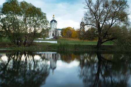 Kolomna, Moscow Region, Russia. Church Of Michael Archangel By River Kolomenka With Reflection At Autumn.の写真素材