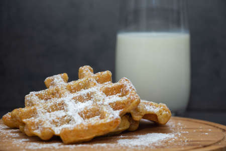 Carrot waffles on white plate. Perfect healthy breakfast.の写真素材