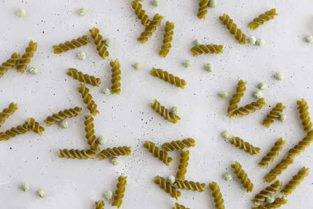 Background from green pasta or pasta made from peas. Vegetarian Pastaの写真素材