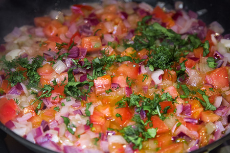Vegetable saute in frying pan. Ratatouille. Fresh vegetables in pan with spicesの写真素材