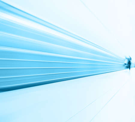 Train in motion blur and blurred people on background の写真素材