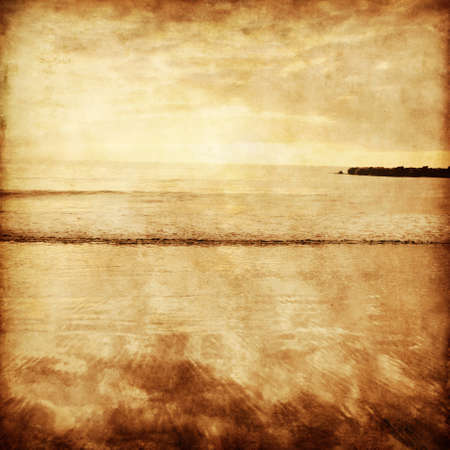 Sunset seascape in grunge and retro style の写真素材