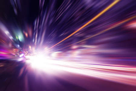 Abstract image of night lights in the city with motion blur.の写真素材