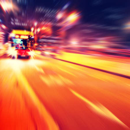 Abstract image of bus in motion blur in the city.の写真素材