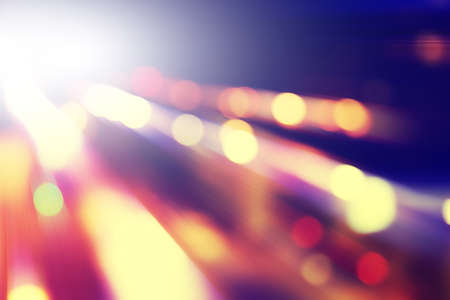 Defocused abstract lights background in motion blur. 