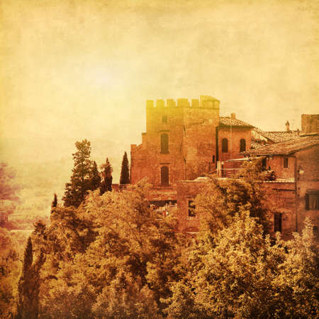 Grunge image of historical building in Tuscany at sunset.の写真素材