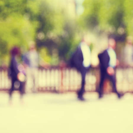 Blurred image of people in the city.の写真素材