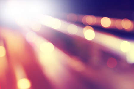 Defocused abstract lights background in motion blur.の写真素材