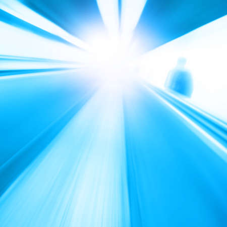 Abstract image of moving walkway and motion blurred man.の写真素材