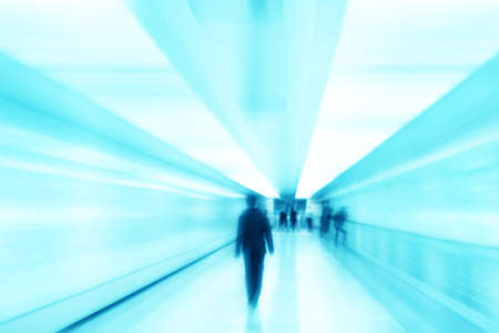 Toned blurred image of people in tunnel.の写真素材