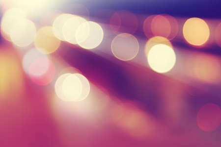 Defocused abstract lights background in motion blur.の写真素材