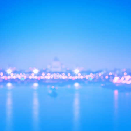 Abstract blurred cityscape background with bokeh effect.の写真素材