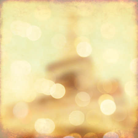 Blurred background of Eiffel Tower with bokeh. Grunge style photo.の写真素材