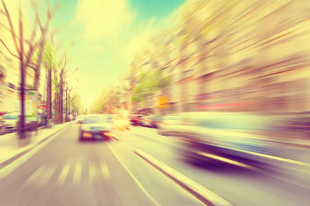 Cars in motion blur on the street. Vintage style.の写真素材
