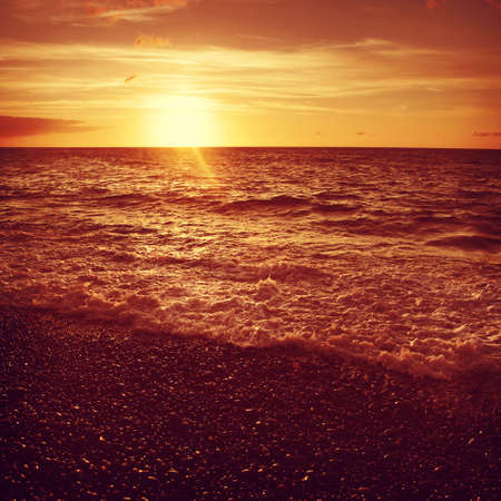 Dramatic sunset over the sea.の写真素材