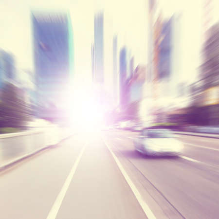 Abstract image of defocused car on the road. Motion blur.