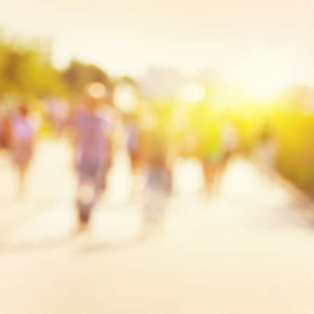 Abstract blurred image of people walking on the street.の写真素材