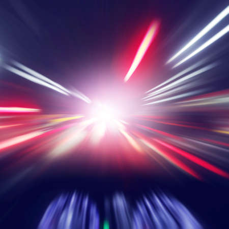 Blurred motion image of car driving fast at night.の写真素材