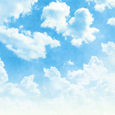Blue sky with white clouds in grunge style.の写真素材