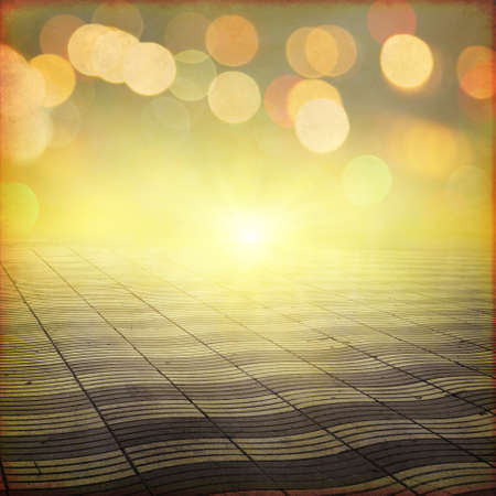 Stone pathway and abstract bokeh lights in grunge style.