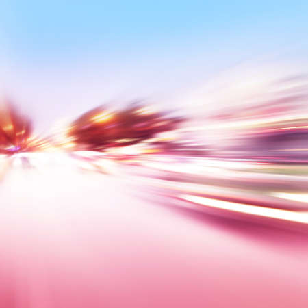 Abstract image of traffic lights with motion blur in the city.の写真素材